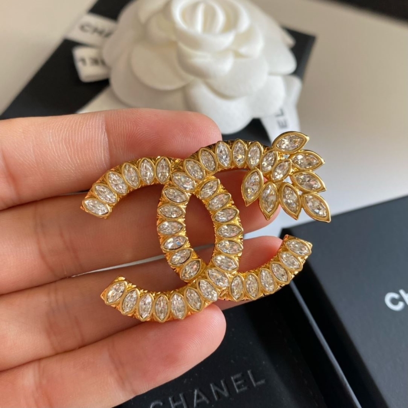 Ch**el brooches